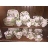 Approx. 80 pieces of Paragon greem gilt and floral china tea ware Live bidding available via our