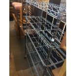 A large steel bottle rack, h146cm, w91cm, d36cm. Live bidding available via our website, if you