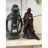 Modern sculpture and a figure Live bidding available via our website, if you require P&P please read
