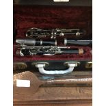 A cased Besson Embassy clarinet. Live bidding available via our website, if you require P&P please