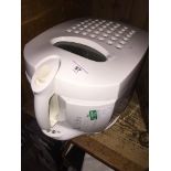 A Kenwood deep fat fryer. Live bidding available via our website, if you require P&P please read