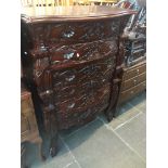 A reproduction Chinese style hardwood carved chest of drawers, h142cm, w96cm, d50cm. Live bidding