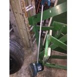 A n electric lawn edger Live bidding available via our website, if you require P&P please read