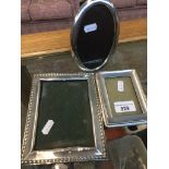 Three hallmarked silver photo frames Live bidding available via our website, if you require P&P