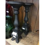 A pair of cast iron candle sticks Live bidding available via our website, if you require P&P