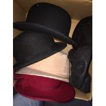 A box of mens and ladies hats, bowler hats, etc. Live bidding available via our website, if you