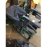 A folding shopping wheelchair Live bidding available via our website, if you require P&P please read