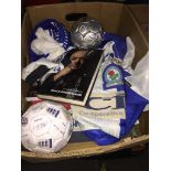 A box of sports memrobillia inc. 3 signed autobiography, 2 signed football and 2 shirts. Live
