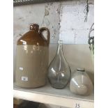 Stonware flagon with stopper approx 42cm high, glass bottle and stoneware bed warmer Live bidding