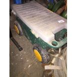 A wheelie tool box with electric drill, lopper blades etc Live bidding available via our website, if