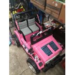 A 4X4 pink SUV for kids with battery and charger - REQUIRES NEW BATTERY