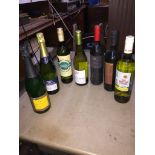 Seven bottles of wine including Buck's Fizz and Champagne