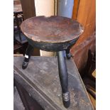 An old stool with carved top - 'Sit Ye Doun'