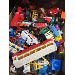 A box of play worn model vehicles and other toys