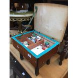 A small sewing box and contents