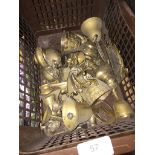 A box of brass ornaments, etc.