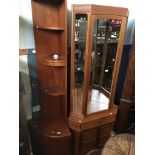 Two teak corner display cabinets, one glazed.