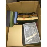 A box of Folio Society books and others.