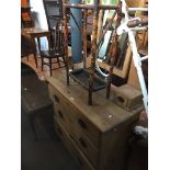 A stripped pine dressing table with swing mirror