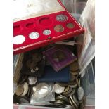 A tub of world banknotes, coins etc