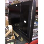 A Panasonic 26" LCD TV with remote