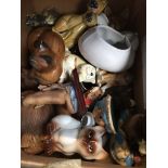 A box of wood and pottery animals.