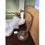 A French Art Nouveau brass adjustable table lamp with pressed frosted glass shade, H35cm.