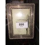 Small silver photo frame with ebonised back