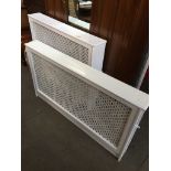 Two white painted radiator covers