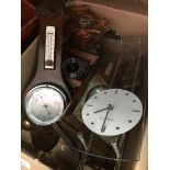 A box of clocks, cuckoo clocks, barometer, etc.