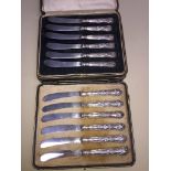 2 antique cased sets HM silver handle kings pattern knives.