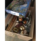 A box of pictures, brass, pottery, etc.