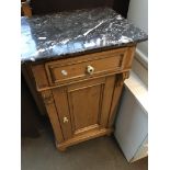 A marble top pine cupboard