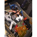 A box of Action Man figures and accessories