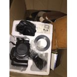 A box of cameras and accessories, Brownie, Kodak 8mm cine camera, etc.