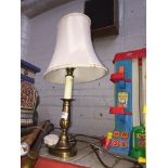 A brass table lamp