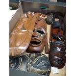 A box of tribal figures/masks, etc.