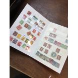 An album of Victorian postage stamps