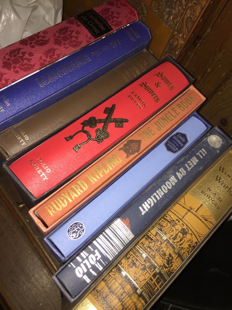 6 Folio Society books and 2 others.