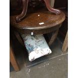 A round occasional table and a small foot stool