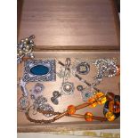 Cigar box of jewellery including some silver.