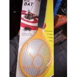 A battery operated fly zapper.