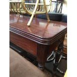 A 19th century mahogany fold out tea table with single drawer on turned legs.