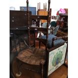 A rush seated ladder back chair