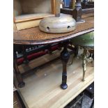 An oak drop leaf table