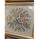 A late 19th/early 20th century embroidery picture, flowers, 46cm x 49cm, framed and glazed.