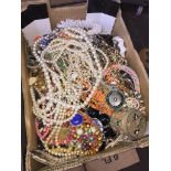 A box containing a large quantity of costume jewellery