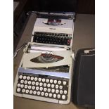 2 vintage typewriters.