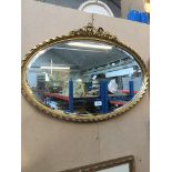 Oval gilt framed mirror