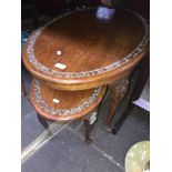 A pair of eastern style oval coffee tables (large & small)